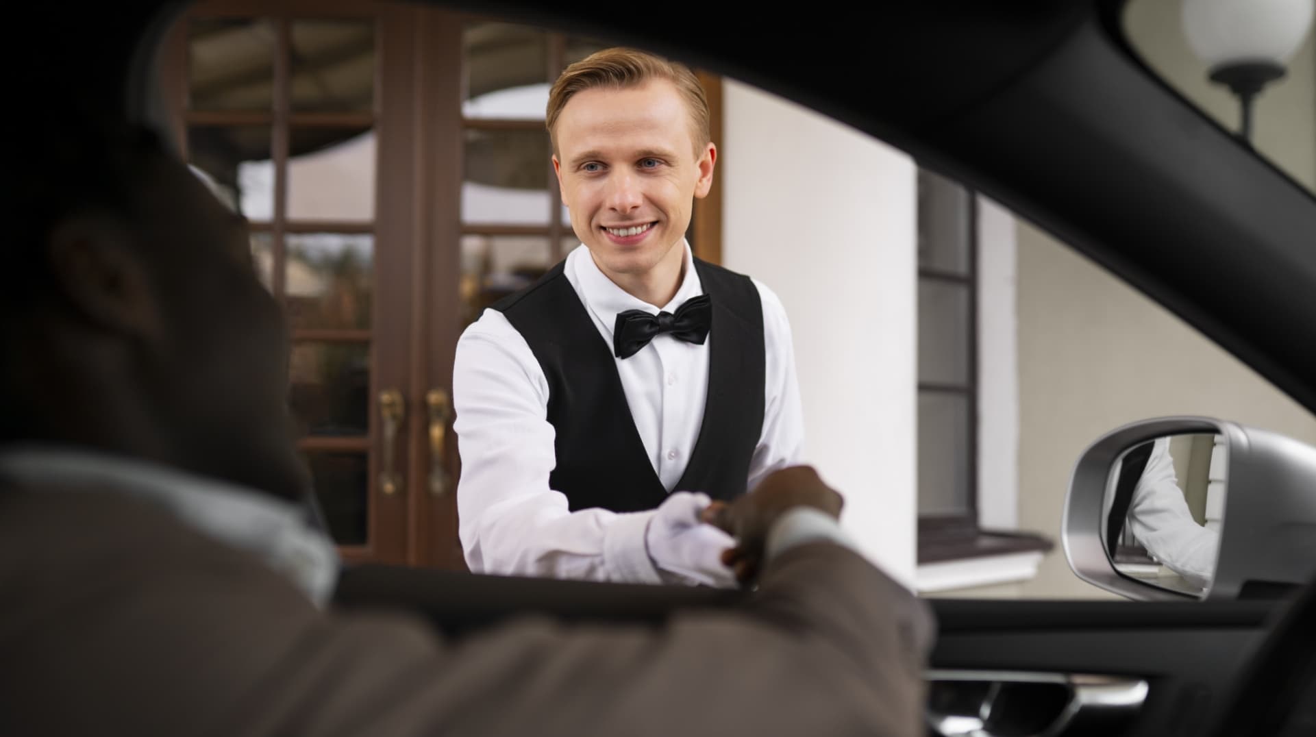 Chauffeur driving a luxury car